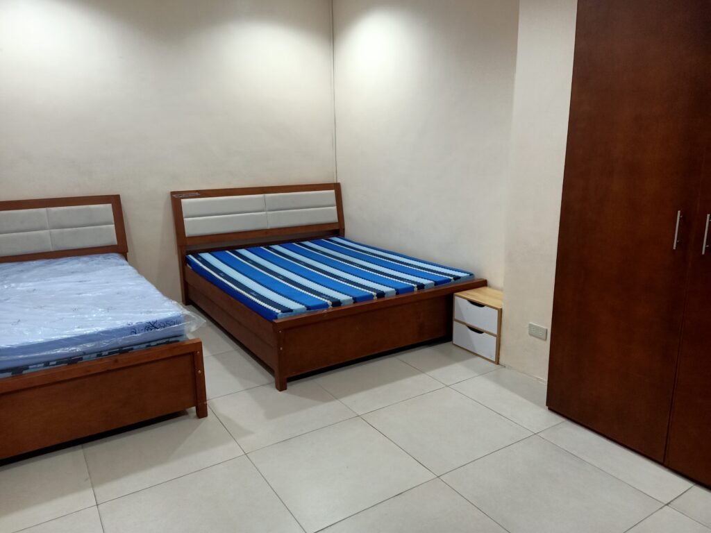 Two queen-sized bedroom in one of the PWD-friendly Rooms