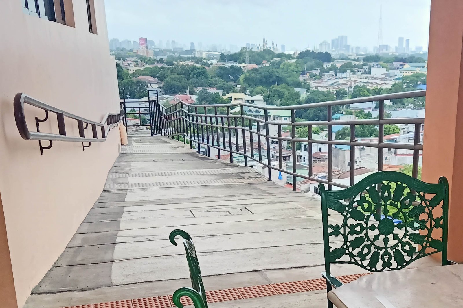 Accessible ramp at the Penthouse floor overlooking Quezon City skyline